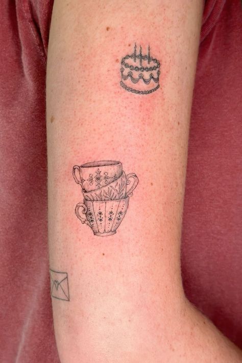 Tiny Coffee Mug Tattoo, Fill Your Own Cup Tattoo, Elbow Framing Tattoo, Stacked Teacup Tattoo, Cookbook Tattoo, Espresso Machine Tattoo, 3 Of Cups Tattoo, Bread And Wine Tattoo, Cozy Tattoo Ideas