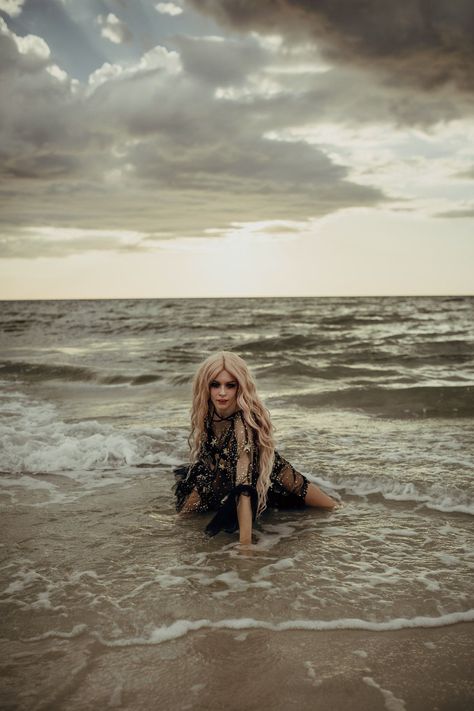 Spooky Season: Beach photography empowerment shoot with a storm rolling in. Storm cloud empowerment photography, boudoir on the beach. Model: Instagram @sarahlynmonroe Water Poses Photography, Water Shoot Ideas, Levitating Photography, Spooky Beach Photoshoot, Muddy Photoshoot, Water Bourdier Photoshoot, In Water Photoshoot, Water Photoshoot Ideas, Beach Shoot Ideas Photoshoot