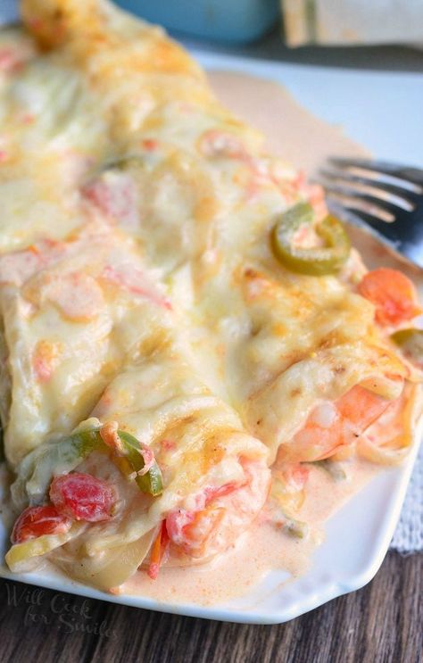 Spicy Creamy Shrimp Enchiladas on a white plate with a fork to the right Creamy Shrimp Enchiladas, Seafood Enchiladas Recipe, Smoked Seafood, Seafood Enchiladas, Shrimp Enchiladas, Best Shrimp Recipes, Authentic Mexican Recipes, Creamy Shrimp, Enchiladas Recipe