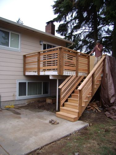 Fall 2009 I removed the existing boards that were rotting and replaced them with 2×6 tight-knot, western red cedar decking. The rebuild included new posts, railings and stairs.  I also replace… Horizontal Deck Railing Ideas, Horizontal Deck Railing, Wood Deck Railing, Deck Stair Railing, Patio Railing, Deck Railing Design, Cedar Deck, Railing Ideas, Deck Stairs