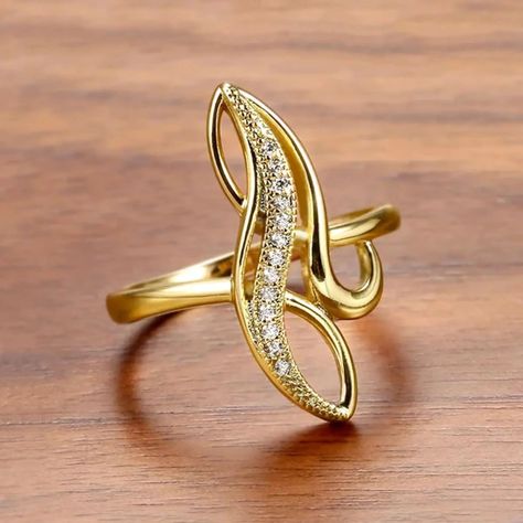 📍Hyperbole Marquise Shaped Gold Color Rings 😍💗💫 👉🏻To order through 📌the websit:https://www.jewelglamour.com/collections/rings/products/huitan-hyperbole-marquise-shaped-gold-color-rings-for-women-full-paved-dazzling-cz-new-trendy-wedding-band-accessories-jewelry 📌 For more info WhatsApp: +44 7460 779657 📌Facebook: https://www.facebook.com/profile.php?id=61556939033801 📌 Instagram : https://www.instagram.com/official.jewelglamour/ #jewelry #jewellery #jewelrylover #jewellerylover Ladies Gold Rings, Chic Rings, Rings Women, Gold Color Ring, Gold Cocktail Ring, Gold Cocktail, Trendy Ring, Infinity Ring, Wedding Band Sets