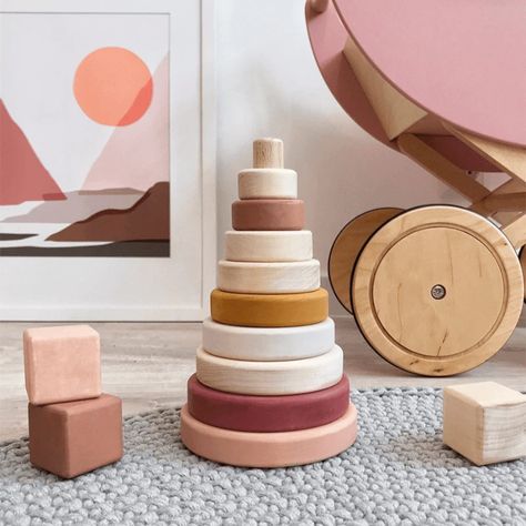 Sabo Wooden Stacking Tower, Marsala This light pink stacking tower doubles as chic nursery decor and makes for a gorgeous first puzzle for toddlers. Handcrafted in Ukraine, the heirloom quality is one that will be cherished for years and makes a perfect present. Dimensions: 8 rings and base, 7.75in tall Shop our coll Stacker Toy, Chic Nursery, Eco Toys, Puzzles For Toddlers, Presents For Girls, Stacking Toys, Building For Kids, Wooden Ring, Baby Furniture