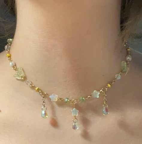 Drops of Stardust choker (adjustable) $35.00 Now available 🌟 #star #stars #gemstones #gemstonejewelry #literature #dragons #dragon #greekmythology #beadsjewelry #cottagecore #fairycore #smallbusiness #smallbusinessowner #smallbusinesssupport #flowers #flower #flowerjewellery #teardrop #teardrops #green Fairycore Jewelry Aesthetic, Handmade Adjustable Fairycore Jewelry, Fairy Core Necklace Aesthetic, Fairycore Beaded Jewelry Gift, Fairy Core Beaded Necklace, Necklace Fairycore, Ethereal Jewelry, Cottagecore Jewelry, Whimsical Jewelry