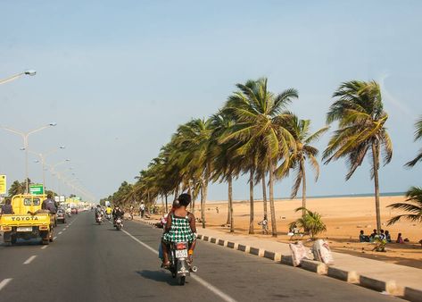 Lome is a coastal town in Togo characterised by palm-lined coastlines Togo West Africa, Nigerian Passport, Togo Africa, Lome Togo, Ethiopia Travel, Africa Holiday, Nigeria Travel, Holiday Image, African Life