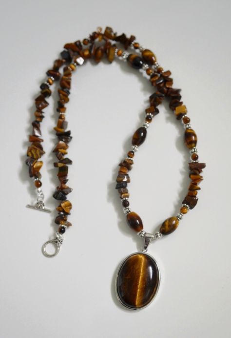 24" necklace with tiger eye beads & tiger eye pendant measuring 1" x 1 1/4"  you can find me on FaceBook at Bandana Janna's Gemstone Jewelry & Accessories Chip Jewelry, Tiger Eye Necklace Men, Diy Pearl Necklace, Tiger Eye Necklace Handmade, Tiger Eye Pendant, Tiger Eye Necklace, Beautiful Beaded Necklaces, Long Statement Necklace, Tigers Eye Gemstone