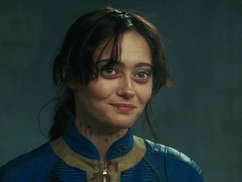 ELLA PURNELL as Lucy Maclean in Fallout Fallout Show Lucy, Lucy Fallout Ella Purnell, Lucy Maclean Fallout, Ella Purnell Fallout, Elle Purnell, Lucy Character, Lucy Fallout, Lucy Mclean, Lucy Maclean