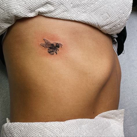 Tattoo Ideas Bumblebee, Bee Tattoo On Ribs, Whimsical Bee Tattoo, Bee Tattoo Placement Ideas, Bee Rib Tattoo, Two Bees Tattoo, Butterfly Bee Tattoo, Bee And Butterfly Tattoo, Dainty Bee Tattoo