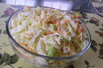 Hawaiian Coleslaw Recipe | Allrecipes Hawaiian Coleslaw Recipe, Grilled Hotdogs, Hawaiian Coleslaw, Traditional Coleslaw Recipe, Sweet Salad, Barbecue Burgers, Cabbage Varieties, Chicken Dressing, Healthy Coleslaw