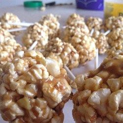 Peanut Butter Popcorn Balls - Allrecipes.com Peanut Butter Popcorn Balls, Chocolate Peanut Butter Popcorn, Popcorn Balls Recipe, Peanut Butter Popcorn, Marshmallow Popcorn, Popcorn Balls, Candy Popcorn, Fall Snacks, Butter Popcorn