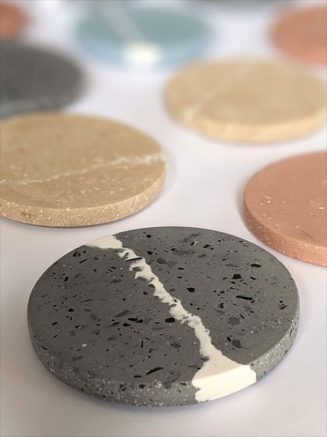 Close up photograph of a black terrazzo coaster. The coasters has whte line running through the middle of it and other coasters blurred out in the background. Terrazzo Coaster, Terrazzo Coasters, Diy Plaster, India Home Decor, Living Room Warm, Eco Friendly Packaging, Stone Design, Natural Earth, New Home Gifts