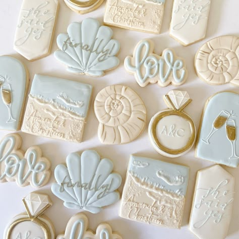 "Celebrate the future Mr. & Mrs. with this beautiful beach themed cookie set! 🍪 Cookie Size: 3-4\" cookies 🍪 Cookie Quantity: 12 cookies (per 1 order quantity)  🍪 Each cookie is made with love by our bakers, please understand there may be slight variations to each cookie due to the handmade nature of our sweets. View all Bridal cookie options on our website here: https://www.rollinindoughfl.com/bridal-collection Please find a list of all ingredients for cookie flavors here: https://www.rollin Beach Wedding Desserts, All I Sea Is Love Theme, Coastal Cowgirl Bachelorette Cookies, Bridal Shower Themes Beach, Beach Bridal Shower Cookies, Last Splash Cookies, Beach Themed Cookies Decorated, Coastal Cookies, Last Toast On The Coast Bachelorette Cookies