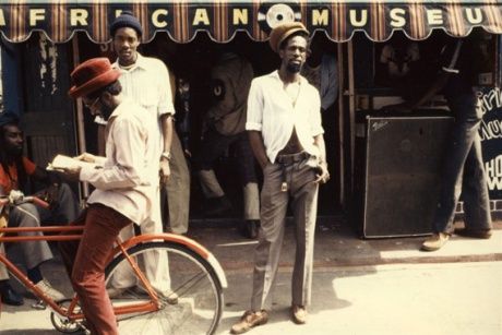 Musician Gregory Isaacs in front of his African Museum store on Chancery Lane, Kingston. Photo: Beth Lesser/Soul Jazz Records Publishing. Gregory Isaacs, African Museum, Puff The Magic Dragon, Citation Rap, Reggae Artists, Reggae Style, Roots Reggae, Jamaican Culture, Music Spotify