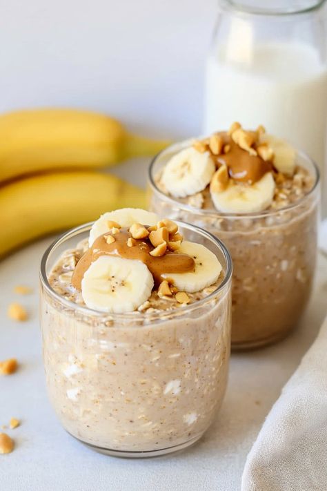 Discover the perfect breakfast recipe with these delicious banana peanut butter overnight oats. Easy to prepare ahead of time, this creamy and nutritious meal is a great way to kickstart your day. Simply mix oats, milk, yogurt, mashed bananas, and a dollop of peanut butter in a jar or container before refrigerating overnight. In the morning, you'll be greeted by a flavorful and satisfying breakfast option that will keep you energized throughout the day. Peanut Butter Jar Overnight Oats, Banana Peanut Butter Overnight Oats, Oat Milk Recipes, Butter In A Jar, Overnight Oats Easy, Peanut Butter Banana Overnight Oats, Oats Milk, Overnight Oats In A Jar, Oat Milk Recipe