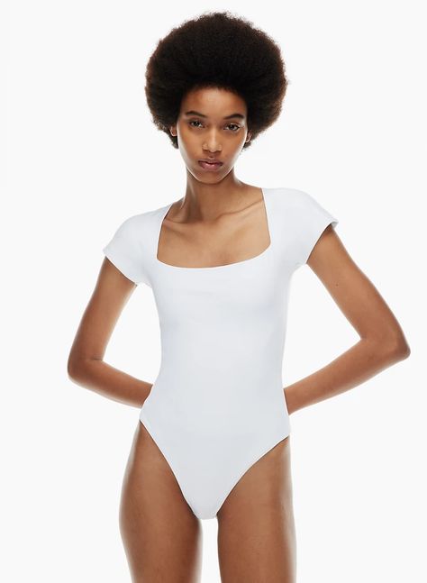 The Babaton Contour Straight Neck Bodysuit is a square-neck cap-sleeve bodysuit. This is a square-neck bodysuit with dolman cap sleeves. It’s made with Contour — a luxe, high-stretch fabric with a second-skin feel. Bodysuit Aritzia, Blue Bodysuit, Turtleneck Bodysuit, Body Suit With Shorts, Square Neck Bodysuit, Pink Bodysuit, Sleeveless Bodysuit, Short Sleeve Bodysuit, Lace Bodysuit