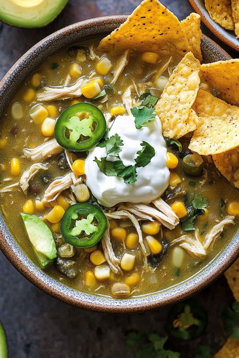 Green Chicken Chili combines tender chicken, green chilies, and a medley of spices to create a rich, zesty one-pot wonder. Healthy Green Chicken Chili, 505 Green Chili Recipes Crock Pot, Healthy Green Chicken Enchilada Soup, Easy Chicken Chili Verde, Green Chilli Soup Recipes, Chili Verde Chicken Soup, Chicken Green Chilli Soup, Green Chicken Chili Recipes, Green Chili Chicken Tortilla Soup