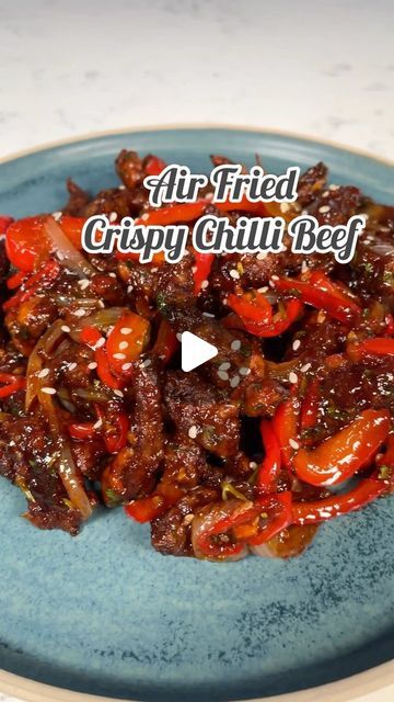 Sam Stern on Instagram: "This crispy chilli beef is my takeaway favourite. I always get it without fail. This airfryer version is just as delicious, slightly healthier, high in protein and easy to make. Who wants it? 
Recipe:
Sauce:
2 tbsp dark soy 
4 tbsp black Chinese vinegar 
2 tbsp sweet chilli sauce 
3 tbsp ketchup 
2-3 tbsp honey 

250g rump steak 
2tsp sesame oil 
1 1/2 tbsp light soy 
1 medium egg, beaten
150g cornflour 
Salt and pepper 
Vegetable oil spray 

2tbsp vegetable oil 
1 onion, sliced 
1/2 pepper sliced 
3/4 tbsp grated ginger 
2 large cloves garlic, crushed 
1 chilli, finely sliced 
1 handful finely sliced coriander 
Sesame seeds 

1. Make the sauce with dark soy, vinegar, sweet chilli, ketchup, honey and mix. Set aside 
2. Slice the steak into thin strips, roughly 1/2c Air Fried Crispy Chili Beef, Crispy Beef Chinese Air Fryer, Air Fryer Crispy Chilli Beef, Air Fryer Crispy Beef, Chinese Beef Recipes, Crispy Chilli Beef, Lazy Cooking, Recipe Sauce, Sweet Chilli Chicken