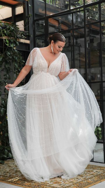 Plus Size Bride on Instagram: "More wedding dress inspiration for the curvy bride to be ……. and definitely touchable. 😉👌🏽👰🏻 Anyone else loving this pearl and tulle wedding dress? 🙋🏽‍♀️😍 If you are getting married could this be the one for you? This beautiful wedding dress will be here soon, and we just can’t wait. 💖 If you want to know when she will be arriving DM PEARL and I will send you all the details of this gorgeous plus size, curvy bride wedding dress available with or without sl Wedding Dresses For Curvy Women, Studio Levana, Curvy Wedding Dress, Curvy Wedding, Plus Size Bridal Dresses, Wedding Dresses Whimsical, Plus Wedding Dresses, Pearl Wedding Dress, Plus Size Wedding Gowns