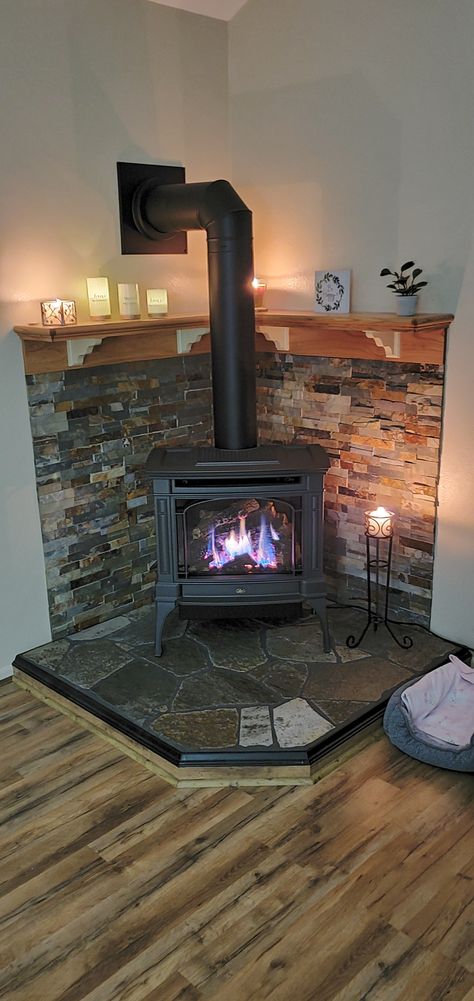 Fireplace Woodburner Ideas, Tile Wall Behind Pellet Stove, Pallet Stove Ideas, Wood Burning Stove In Corner Of Living Room, Potbelly Stove Decor Living Rooms, Enclosed Porch With Wood Stove, Wood Burn Stove Living Room, Free Standing Wood Burning Fireplace Ideas, Tv And Wood Stove Layout