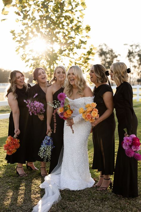 Bridal Bouquet Different From Bridesmaids, Bridesmaid One Flower Bouquet, Mix And Match Bridesmaid Bouquets, Black Bridesmaid Dresses Bright Florals, Black Bridesmaid Dresses With Colourful Flowers, One Type Of Flower Bouquet, Mixed Bridesmaid Bouquets, Black Bridesmaid Colorful Flowers, Different Bouquets For Bridesmaids