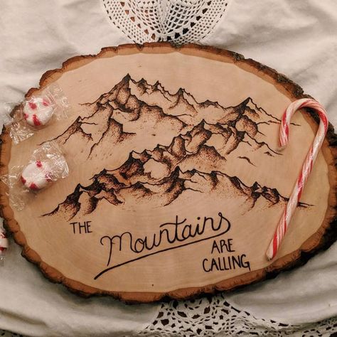 A piece for all of the mountain lovers out there! This is hand wood-burned. The Medium size is about 9 inches in length and about 7 inches in width. The Large size is about 14 inches in length and about 9 inches in width. Wood Burning Mountain Range, Burning Mountain, Business Crafts, Wood Burn Designs, Quilted Coasters, Cabin Christmas, Craft Wood, Mountains Are Calling, Wood Burning Crafts