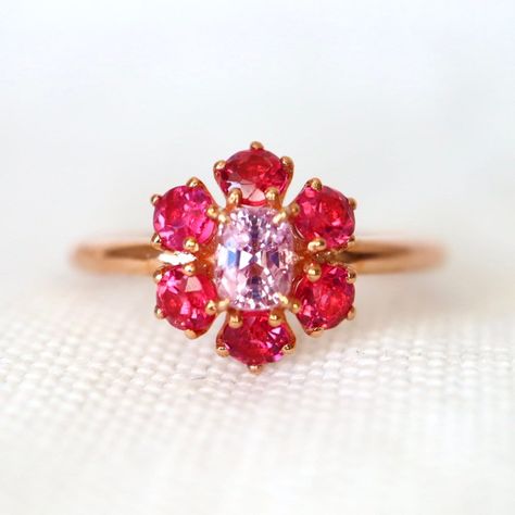 Mini Halo. Neon Reddish Pink Spinel Halo Ring with pink spinels. Pink Engagement Ring .14K Rose Gold Size 7 If you are interested to create something similar with your own style, please do not hesitate to contact me for a custom order. Condition: Brand New & Custom Designed by me Size: US 7.25 sizable Metal: Solid 14K Rose Gold Center Stone: Untreated Purple Spinel 0.5ct Side Stones: Neon Pink Spinels 0.9ct.  Measurement: 9mm*9mm Certificate Included. 7-day return accepted. This item is brand ne Pink Flower Engagement Ring, Pink Gem Ring, Prom Planning, Pink Gemstone Ring, Pink Engagement, Engagement Ring Dainty, Pink Engagement Ring, Ring Inspo, Spinel Ring