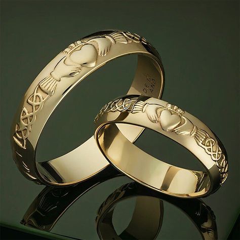 14k Gold Claddagh Wedding Rings | Men's and Women's Irish / Celtic Wedding Bands Stunning matching gold wedding bands! Handmade in Ireland and Irish Hallmarked 14k Gold in Dublin Castle. Each ring sold individually. The iconic 17th century symbol evokes love, loyalty, devotion and friendship. It echoes the words of the Irish sailor who first created this design: “With these hands I give you my heart, and I crown it with my love”. Material: 14k gold.Approx. Ring Weight: 3.1 grams for women's, 4.5 Wedding Claddagh Rings, Irish Wedding Rings Unique Celtic Wedding Rings, Mens Claddagh Wedding Band, Claddagh Wedding Bands, Matching Wedding Bands His And Hers Unique, Celtic Wedding Ideas, Eclipse Wedding, Irish Wedding Dresses, Claddagh Wedding Ring