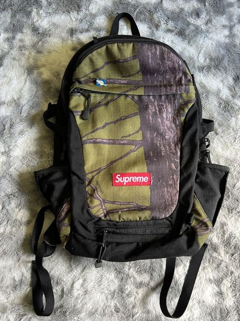 2012 Tree Bark Camo Backpack Supreme Accessories, Camo Backpack, Supreme Bag, Youtube Logo, Tree Bark, Men's Accessories, Luggage Bags, Accessories Shop, Camo