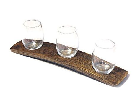 Return Policy Fast Delivery Trusted seller Barrel Stave 3 Glass Wine Flight Serving Tray Glasses Included, Dark Walnut Product Description VINEYARD VIBES - taste or serve your favorite wines in a creative way HAND CRAFTED - from repurposed red wine barrels which gives it a rich red burgundy stain underneath GREAT GIFT - a creative and personal present for all vino fans INCLUDES - three 5.5 oz stemless wine glasses MADE IN THE USA - using reclaimed French & Spanish wine barrels, Approx. 17" x 4" Shipping Returns Payment Shipping Shipping is FREE to all addresses other than APO/PO boxes in the lower 48 states. All our stock ships from US-based warehouses. Shipped via USPS or UPS (depending on location and package weight) Unless stated otherwise, all orders will ship within 24-72 hours of you Wine Flight, Spanish Red Wine, Wine Barrel Decor, Barrel Art, Barrel Decor, The Originals 3, Barrel Stave, Wine Collection, Wine Barrel