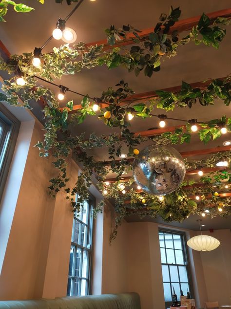 Vines And Lights On Ceiling, Indoor String Light Ideas, Vertical Wall Planter Pots, Christmas Ceiling Decorations, Metal Wall Planters, Salon Suites Decor, Indoor String Lights, Design Exterior, Rustic Dining Room