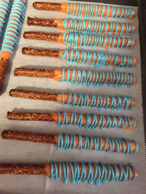 Bluey Theme Candy Apples, Blue And Gold Pretzel Rods, Bluey Birthday Party Food, Blue And Gold Chocolate Covered Pretzels, Bluey Theme Chocolate Covered Pretzels, Finding Nemo Pretzel Rods, Pretzel Rods, Chocolate Pretzels, 2nd Birthday Party Themes