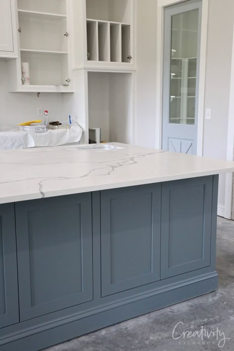 Blue Kitchen Islands With White Cabinets, White Kitchen Cabinets With Color Island, Kitchen Island Ideas Colors, Countertops With Veining, White And Blue Cabinets, Cabinet And Island Different Color, Off White And Blue Kitchen, Kitchen Cabinets Blue On Bottom White On Top, Island Kitchen Color Ideas