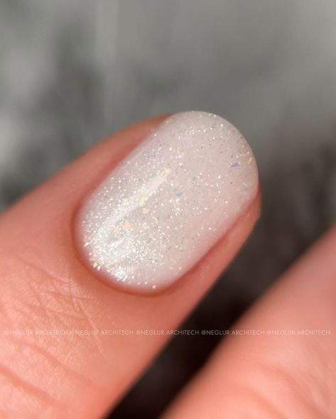 This perfect-gleam combination ✨ milky white & glitter, Celeste Gelaxyo / Russian Manicure —Neglur Architech, Certified Nail Technician, Reykjavik #nails #milkywhitenails #gelmanicure #gelnails #neglur Milky Nails Sparkle, Shimmering White Nails, Chunky White Glitter Nails, Milk White Nails With Glitter, Sparkly White Nails Short, Milky White Nails Sparkle, Milky White Holiday Nails, Milky White Nails With Sparkle, Sparkly Milky White Nails