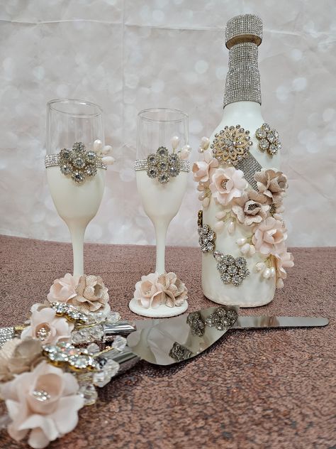 Set includes: Reusable empty Bottle Cakes Server 2 Champagne Glasses Everything decorated as is in picture. Centerpieces With Wine Glasses, Wedding Champagne Bottles, Champagne Glasses Decorated, Disney Wedding Shoes, Reuse Wine Bottles, Quinceañera Ideas, Candle Sets, Bottle Cake, Random Products