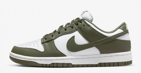 The Nike Dunk Low will now come in a “Medium Olive” colorway. With its white leather base and bright red overlays, this Dunk Low is a throwback to the classic two-tone Dunk look. However, as a lighter shade of olive green than the “Cargo Khaki,�” the “Medium Olive” Dunk Low is an excellent option for those who liked the high-top version but preferred the low-top. The Nike Dunk Low Medium Olive is available in official photos. Nike.com and select retailers shoul Nike Dunks Olive Green, Nike Olive Green Shoes, Nike Dunk Low Medium Olive Outfit, Medium Olive Dunks Outfit, Nike Dunk Low Olive Green, Olive Dunks, Nike Dunk Low Medium Olive, Green Dunks, Womens Dunk Low