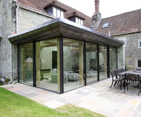 Glass extension costs: Expert advice on managing budgets | Homebuilding Glazed Extension, Sunroom Extension, Glass Box Extension, Kitchen Orangery, Crittal Doors, Kitchen Conservatory, Flat Roof Extension, Minimal Windows, Property Renovation