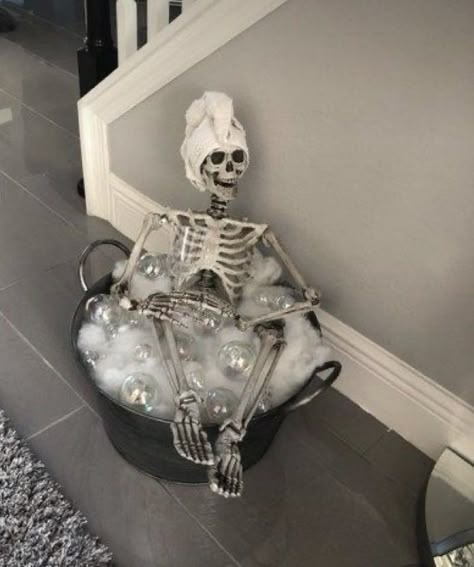 Ghost And Skeleton Decor, Skeleton Living Room Decor, Skeleton Cauldron Bath, Skeleton In Tub With Bubbles, Med Spa Halloween Decor, Black Skeleton Decor, Skeleton Bubble Bath Diy, Spa Skeleton, Skeleton Taking A Bath