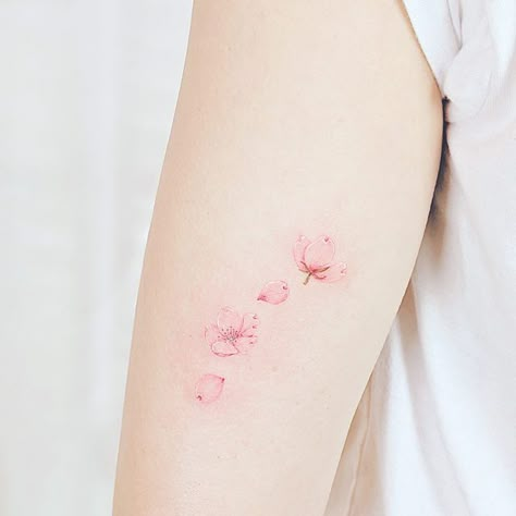 Fine Line Tattoo Cherry Blossom, Japanese Sakura Tattoo, Minimalist Tattoo Cherry Blossom, Red Ink Cherry Blossom Tattoo, Cherry Blossom Tattoo Pink, Falling Cherry Blossom Tattoo, Fine Line Cherry Blossom Tattoo, Sakura Butterfly Tattoo, Cherry Blossom Tattoo Watercolor