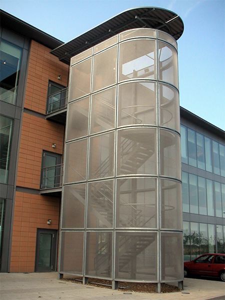 Transparent Staircase, Staircase Cladding, Metal Mesh Architecture, Mesh Architecture, Staircase Architecture, Stair Elevator, Modern Warehouse, Renovation Architecture, Elevator Design