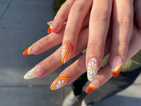 Orange red yellow white florals and abstract lines nail design gel polish acrylic full set almond shape Groovy Floral Nails, 1960s Nail Art, 70 Nails Art Designs, Groovy Almond Nails, 70s Groovy Nail Art, 70s Inspired Nails Acrylic, Groovy Summer Nails, Groovy Nails Acrylic, 70s Theme Nails