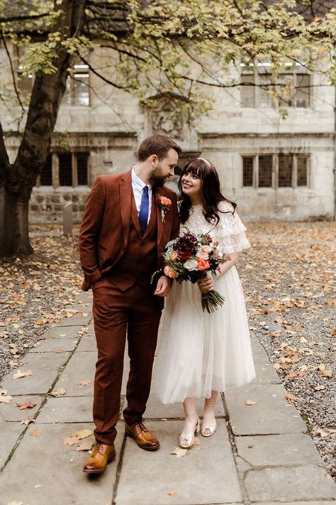 Cute couple portrait of bride in Needle and Thread bridal separates and groom in three piece burgundy suit for city wedding Groom In Burgundy, Needle And Thread Bridal, Christian Photography, Registry Office Wedding, White Bridesmaid, Budget Friendly Wedding, White Bridesmaid Dresses, Burgundy Suit