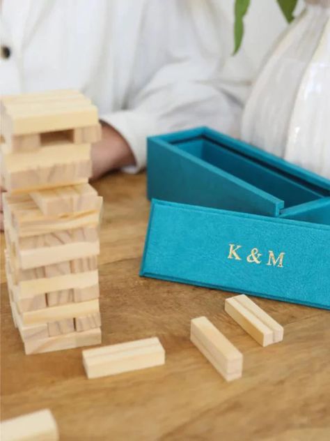 (Gifting) game on.
This jenga game is composed of smooth wooden blocks stored in an elegantly customised box. The perfect housewarming gift or a fun way to elevate family game night. Jenga Game, Jenga Blocks, Ski Gifts, Perfect Game, Family Game, Family Game Night, Playing Card, Table Games, Gaming Gifts