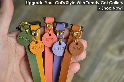 Elevate your cat's look with our trendy cat collars! From chic designs to durable materials, find the perfect accessory for your feline friend. Shop now and give your cat the style upgrade they deserve. Explore our collection of cat collars today! Leather Cat Collar, Cat Collar Tag, Kitten Collar, Luxury Dog Collars, Kitten Collars, Custom Dog Collars, Handmade Dog Collars, Cat Tags, Personalized Dog Collars