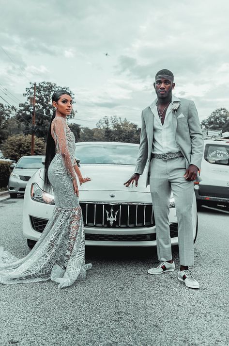 Prom 2023 Black Couples, Grey Prom Dress Couple, Black And Silver Prom Suits For Guys, Silver Suit For Men Prom, Silver Prom Outfits For Couples, Prom 2k23 Black Couple, Black Couples Homecoming Outfits, Silver And Black Prom Suit, Prom Couples Silver