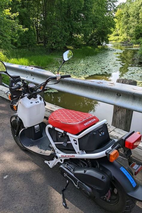 Gary's Honda Ruckus with our satin red diamond seat cover. This looks like my kind of place!! 🌲🛶🛵 #cheekyseats #HondaRuckus #michiganruckus Honda Ruckus Accessories, Vespa Gt, Chetak Scooter Modified, Vespa Lx, Vespa Gtv, Vespa Sprint, Vespa S, Vespa Gts, Honda Ruckus