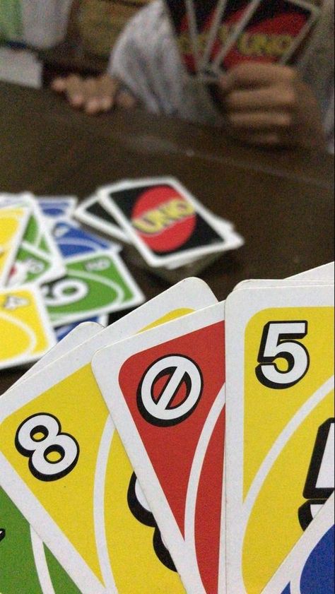 A fun game of Uno at a party with friends Earth Tone Aesthetic, Friends Party Night, Dare Games, Uno Card Game, Uno Cards, Classic Card Games, Night Travel, Card Games For Kids, Fashion Drawing Sketches