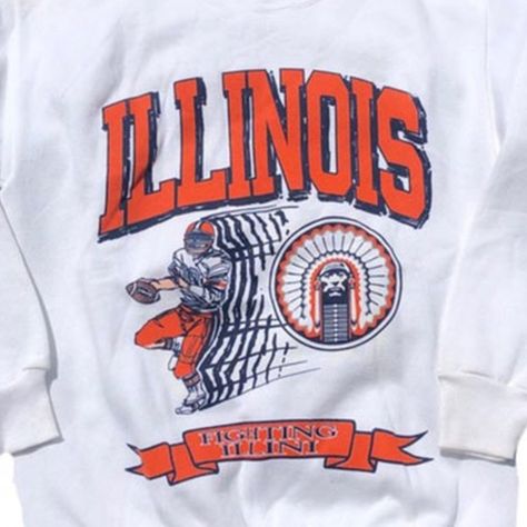 Vintage Ncaa Illinois Fighting Illini Shirt, University Of Illinois Shirt, College Football Shirt, Graphic Shirt For Women Men, Fan Gift Product Information Promise That You Will Get The Best Products We Have. With Variety Of T Shirts Styles, Sizes And Colors. -------- Sweatshirt - Gidan 18000 -------- "Spun Yarn For Softer Feel And Reduced Pilling Double-Needle Stitching At Shoulders, Armholes, Neck, Waistband And Cuffs 1x1 Rib With Spandex For Enhanced Stretch And Recovery Classic Fit Tubular Body Grey Pearlized Tear Away Label Transitioning To New Black Razor Tear Away Label In 2022 See Colours For Exceptions" *Care Instructions: Machine Wash: Warm (Max 40c Or 105f); Non-Chlorine: Ble College Tshirt Outfit, University Shirt Design, College Sweaters, College Wishlist, College Sweater, University Shirt, University Of Illinois, University Tshirt, Vintage College