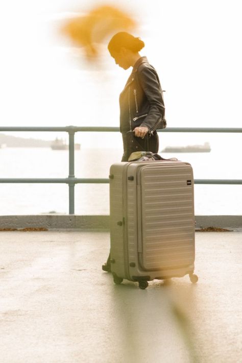 Women walking with large LOJEL Cubo luggage wearing a leather jacket Lojel Luggage, Bottle Bag, Flats Top, Luggage Bags, Minimalist Fashion, Umbrella, Mood Board, Shells, Lifestyle