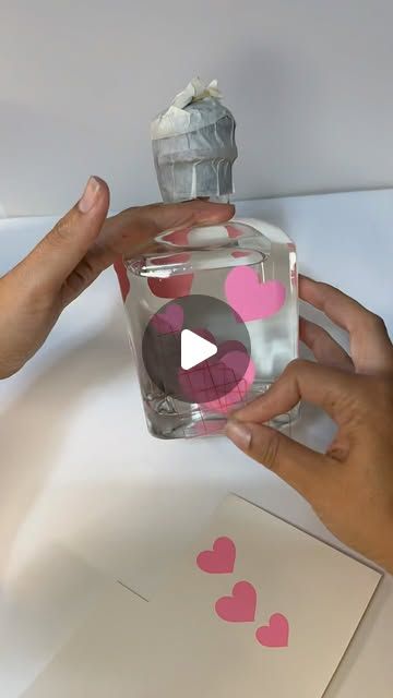 Maricela Arias/Botellaslatoxica on Instagram: "Open heart window tutorial🩷🎀🔥🍾 . . . #explore #patron #hellokitty #pinkglitter #pink #florist #glitter #art #tequila #donjulio #explorepage #tutorial #fyp #forher #botellaspersonalizadas #aestetic #gift #smallbusiness #pinkaesthetic #christmas  #custombottles #fall #pink #pearls #hearts #disco #rosa #coquette #diy #losangeles #mexico" Pink Whitney Bottle Crafts, Ideas For Liquor Bottles, Painting Liquor Bottles Diy, Patron Bottle Decorated, Glitter Vodka Bottle, Glitter Crafts Adults, Bling Bottles Liquor Diy, Diy Liquor Bottle Crafts, Valentines Wine Bottle Crafts