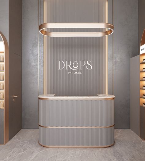 Perfume Store Interior Design, Modern Boutique Interior, Spa Reception Desk, Perfume Boutique, Gold Salon, Salon Office, Spa Reception, Retail Store Display, Jewelry Store Design