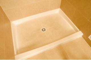 How to Get a Brown Stain Out of a Shower Floor | eHow Fiberglass Shower Pan, Cabinets Makeover, Shower Basin, Hard Water Stain Remover, Fiberglass Shower, Cleaning Painted Walls, Glass Cooktop, Deep Cleaning Tips, Hard Water Stains